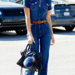 Kendall Jenner dons a denim jumpsuit as she heads to the family offices